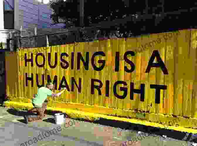 A Group Of Squatters Standing In Front Of A Building With A Banner That Says 'Housing Is A Human Right.' Squatters In The Capitalist City: Housing Justice And Urban Politics (Housing And Society Series)