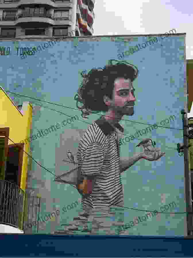 A Street Artist Painting A Mural In Vila Madalena The City Of Sao Paulo By Graffiti