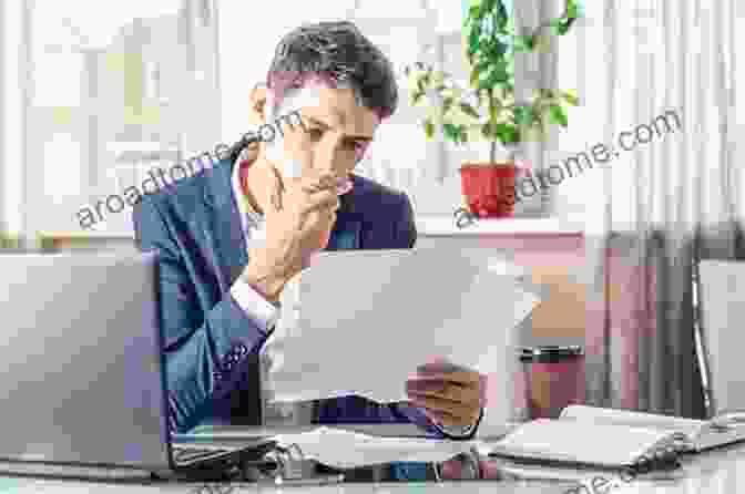 Accountant Reviewing Financial Documents As Part Of An Insolvency Assessment Corporate Insolvency Law: Perspectives And Principles