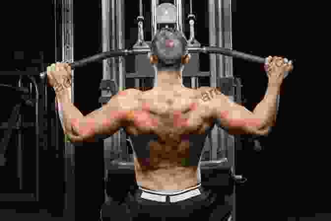 Man Performing Back Strengthening Exercises In Gym The Back Sufferers Bible Sarah Key