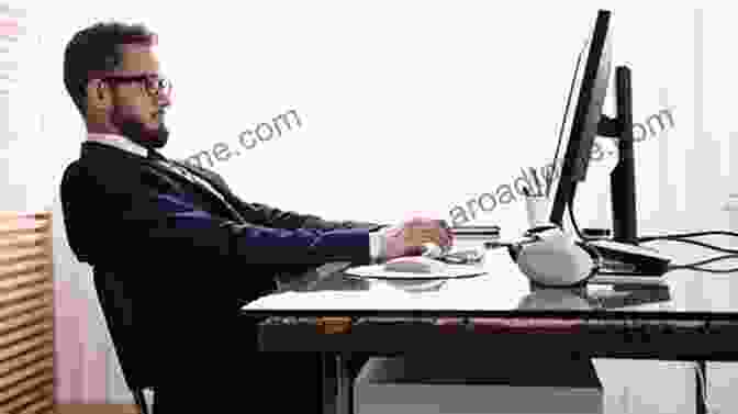 Man Sitting At Desk For Long Periods With Sedentary Lifestyle The Back Sufferers Bible Sarah Key